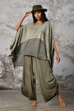 An enchanting Bohemian Leila, perfect for boho and festival-inspired looks, exuding a goddess-like quality. Green bohemian style perfect for Burning Man and other occasions. Menswear Boho Shirt. Boho sleeveless poncho unisex